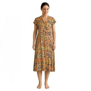 Brown & blue vintage dress with a unique design 
Betsy Laure
Size 12
100% Rayon